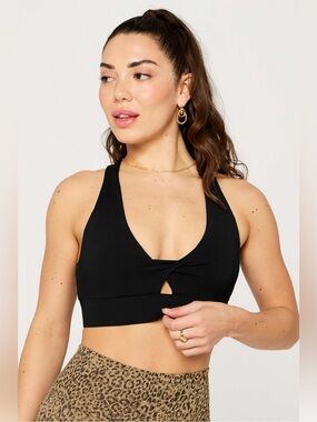 Fabletics Oasis Twist Medium Impact Sports Bra in Black | Size XXS